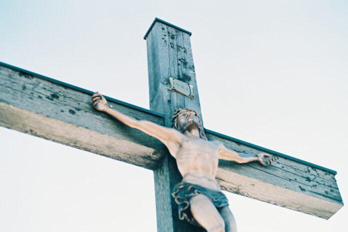 Photo by Christoph Schmid Jesus Christ on cross painting